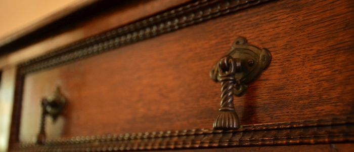 Antique furniture moved from storage and refinished